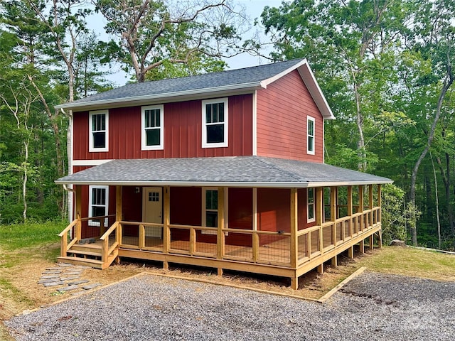 206 Cascade Ridge Rd, Fairview, NC 28730 - country-style home featuring covered porch, a shingled roof, and board and batten siding