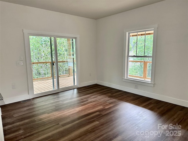 206 Cascade Ridge Rd, Fairview, NC 28730 - unfurnished room featuring baseboards and dark wood-style floors