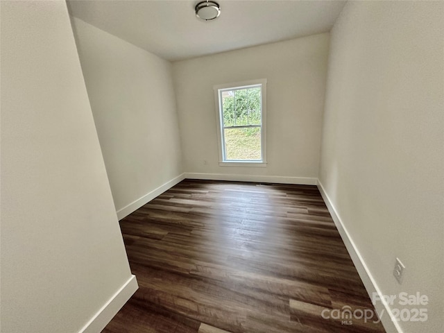 206 Cascade Ridge Rd, Fairview, NC 28730 - empty room featuring baseboards and dark wood-type flooring