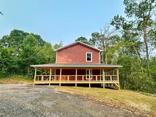 206 Cascade Ridge Rd, Fairview, NC 28730 - country-style home featuring covered porch and roof with shingles