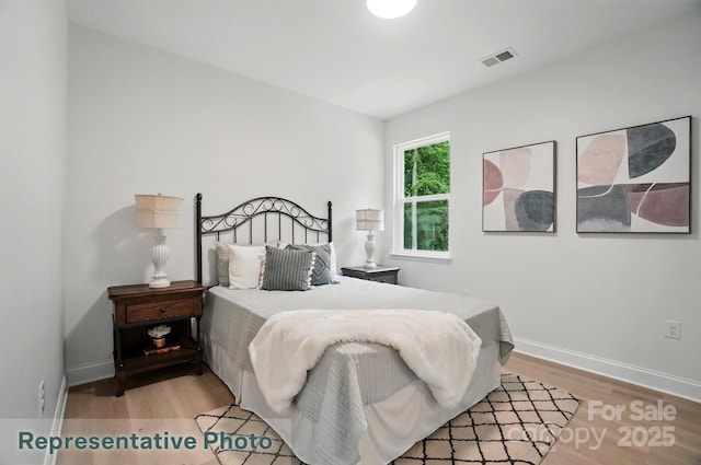 2116A Glenwood St, Kannapolis, NC 28083 - bedroom featuring light wood-style flooring and baseboards