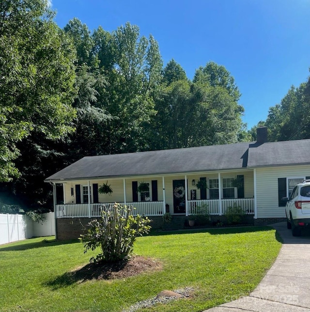 4337 Gelinda Ct, Gastonia, NC 28056 - ranch-style home featuring covered porch, a front lawn, and a chimney