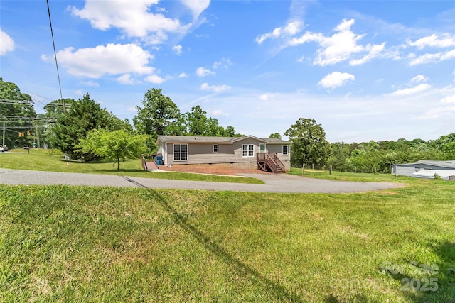 1730 Woodbend Ln, Conover, NC 28613 - view of front of house with crawl space, a front lawn, and driveway