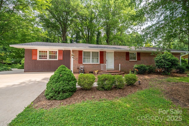 3120 7th Street Dr NE, Hickory, NC 28601 - ranch-style home featuring brick siding and view of scattered trees