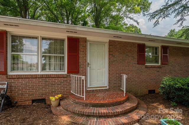 3120 7th Street Dr NE, Hickory, NC 28601 - entrance to property featuring crawl space and brick siding
