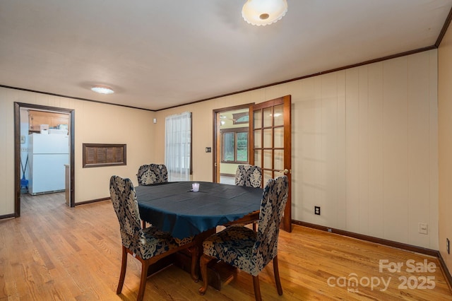 3120 7th Street Dr NE, Hickory, NC 28601 - dining room with light wood-type flooring and ornamental molding