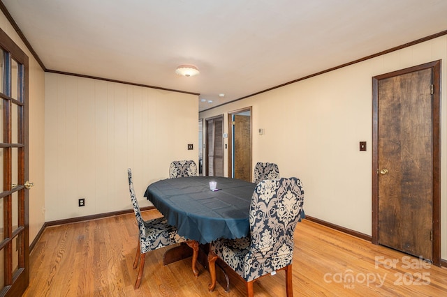 3120 7th Street Dr NE, Hickory, NC 28601 - dining room featuring light wood finished floors and ornamental molding