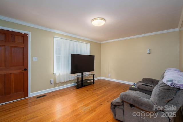 3120 7th Street Dr NE, Hickory, NC 28601 - living room featuring wood finished floors and crown molding