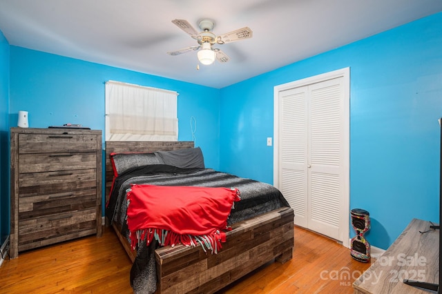 3120 7th Street Dr NE, Hickory, NC 28601 - bedroom featuring wood finished floors, a closet, and a ceiling fan