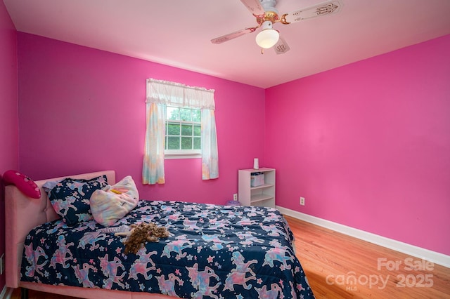 3120 7th Street Dr NE, Hickory, NC 28601 - bedroom with wood finished floors and ceiling fan
