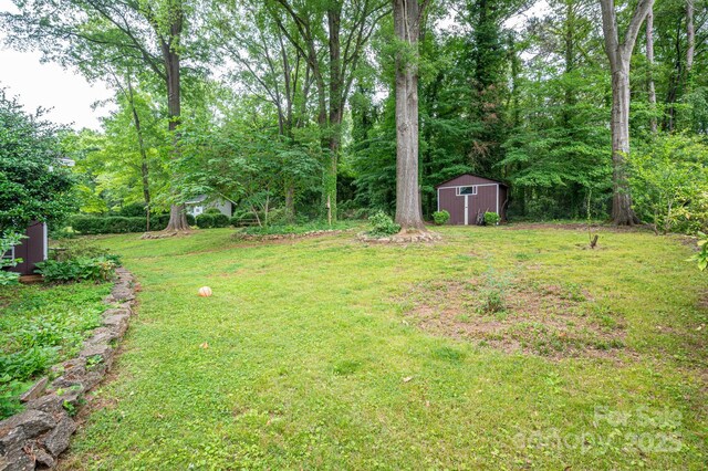 3120 7th Street Dr NE, Hickory, NC 28601 - view of green lawn featuring a shed