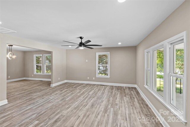 933 Old Charlotte Rd, Concord, NC 28027 - empty room featuring light wood finished floors, baseboards, recessed lighting, and a ceiling fan