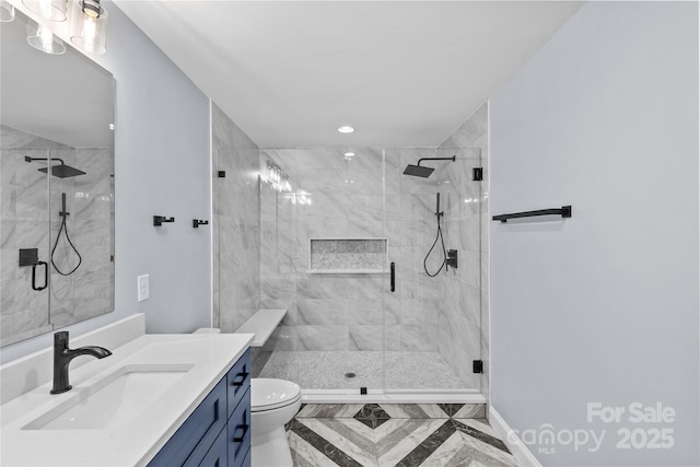 933 Old Charlotte Rd, Concord, NC 28027 - full bath featuring toilet, vanity, a marble finish shower, recessed lighting, and marble finish flooring