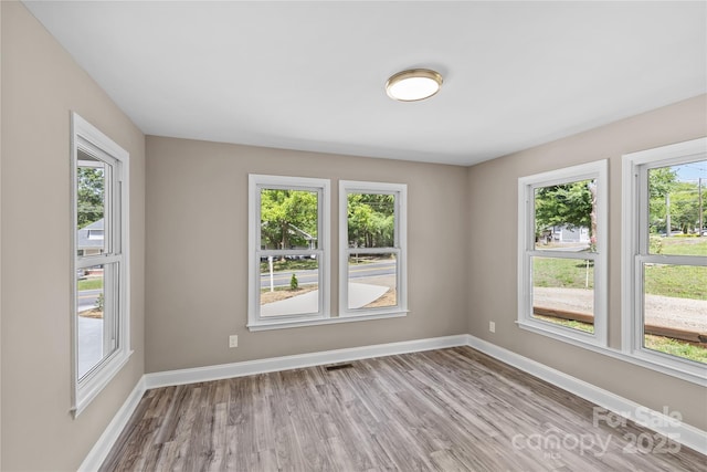 933 Old Charlotte Rd, Concord, NC 28027 - unfurnished room featuring wood finished floors and baseboards