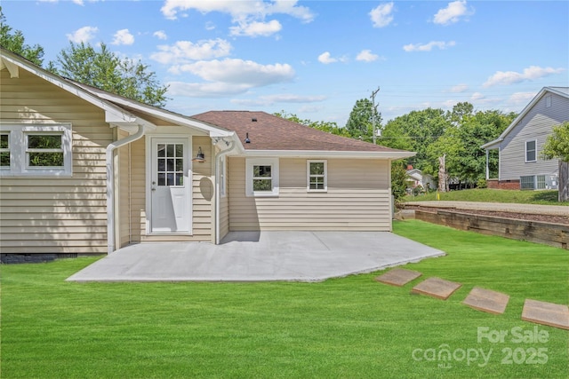 933 Old Charlotte Rd, Concord, NC 28027 - rear view of property with a patio area, a lawn, and a shingled roof