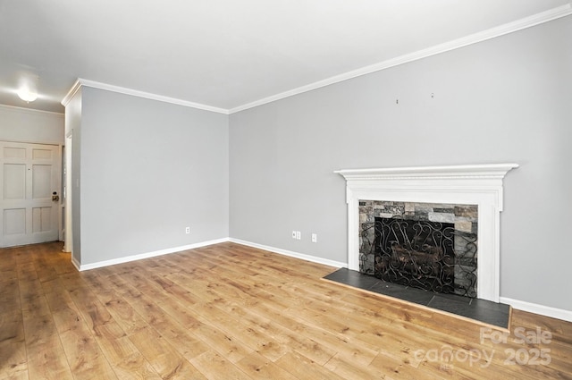 5947 Quail Hollow Rd Unit A, Charlotte, NC 28210 - unfurnished living room with ornamental molding, wood-type flooring, and a stone fireplace