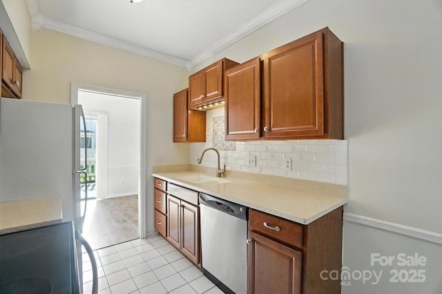 5947 Quail Hollow Rd Unit A, Charlotte, NC 28210 - kitchen featuring stainless steel dishwasher, stove, crown molding, freestanding refrigerator, and tasteful backsplash