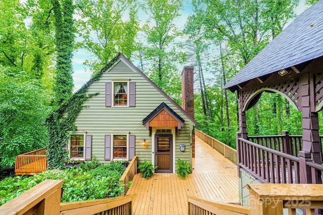 809 Westminster Cir SW, Lenoir, NC 28645 - view of front of house with a chimney and a deck