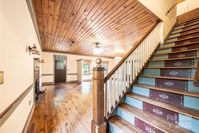 809 Westminster Cir SW, Lenoir, NC 28645 - staircase with wood ceiling, wood-type flooring, and a ceiling fan