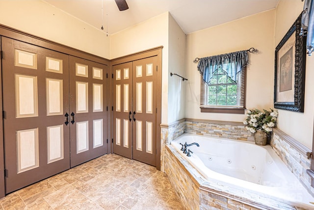 809 Westminster Cir SW, Lenoir, NC 28645 - full bathroom with french doors, a jetted tub, and a ceiling fan