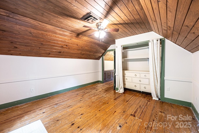 809 Westminster Cir SW, Lenoir, NC 28645 - additional living space featuring wood ceiling, vaulted ceiling, hardwood / wood-style flooring, a ceiling fan, and baseboards