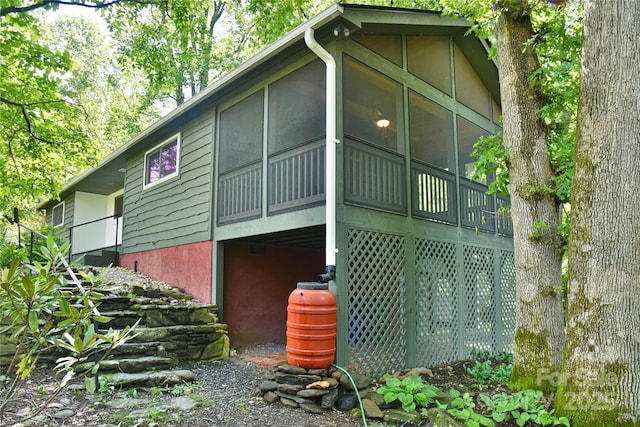 5 Old Cove Rd, Black Mountain, NC 28711 - view of side of home featuring a sunroom