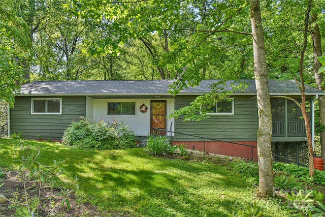 5 Old Cove Rd, Black Mountain, NC 28711 - single story home featuring a front yard, a sunroom, and roof with shingles