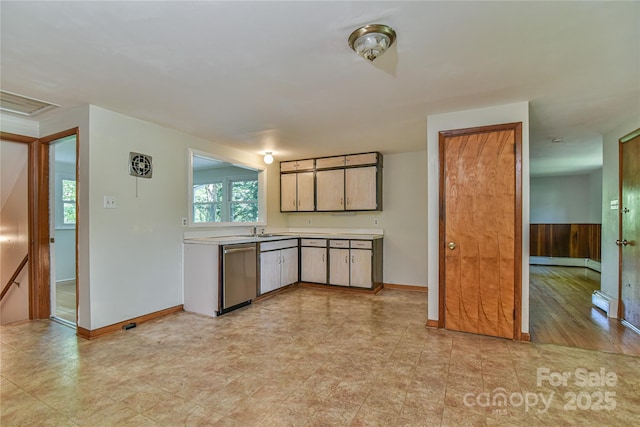 5 Old Cove Rd, Black Mountain, NC 28711 - kitchen with dishwasher, a sink, light countertops, and baseboards
