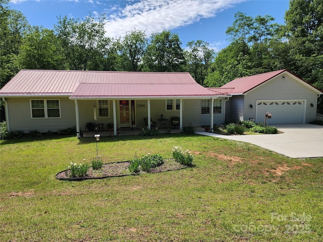2904 E Brocktown Rd, Moravian Falls, NC 28654 - single story home featuring a garage, a front lawn, driveway, and metal roof