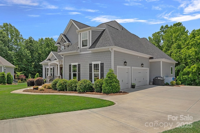 224 Hidden Meadows Dr, Mooresville, NC 28117 - view of front facade with a front lawn, roof with shingles, concrete driveway, and a garage