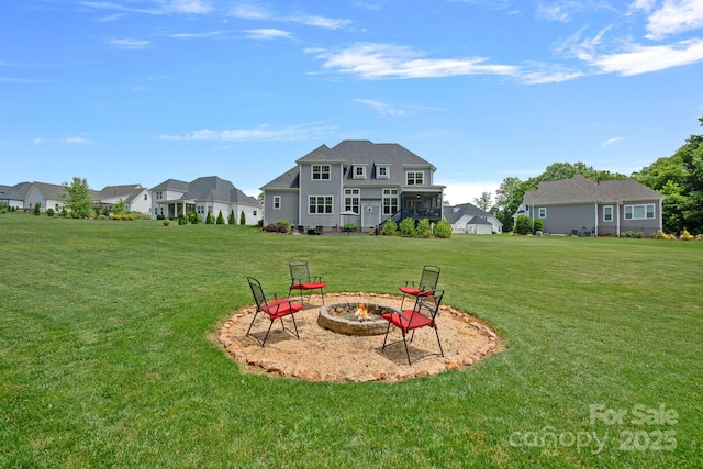 224 Hidden Meadows Dr, Mooresville, NC 28117 - view of grassy yard featuring a fire pit and a residential view