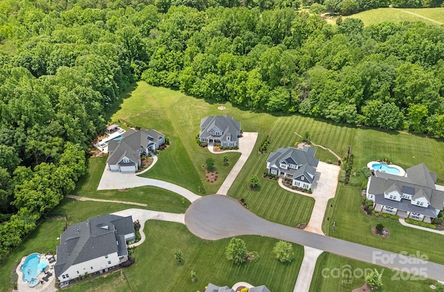 224 Hidden Meadows Dr, Mooresville, NC 28117 - aerial overview of property's location featuring a heavily wooded area