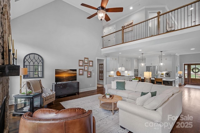 224 Hidden Meadows Dr, Mooresville, NC 28117 - living area with a high ceiling, wood finished floors, a ceiling fan, baseboards, and recessed lighting