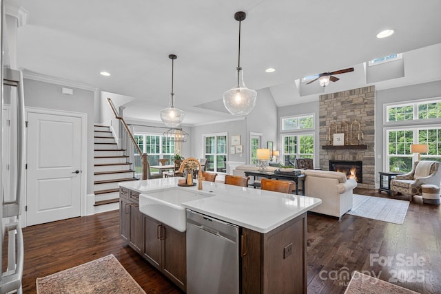 224 Hidden Meadows Dr, Mooresville, NC 28117 - kitchen featuring stainless steel dishwasher, a sink, dark wood-style flooring, recessed lighting, and light countertops