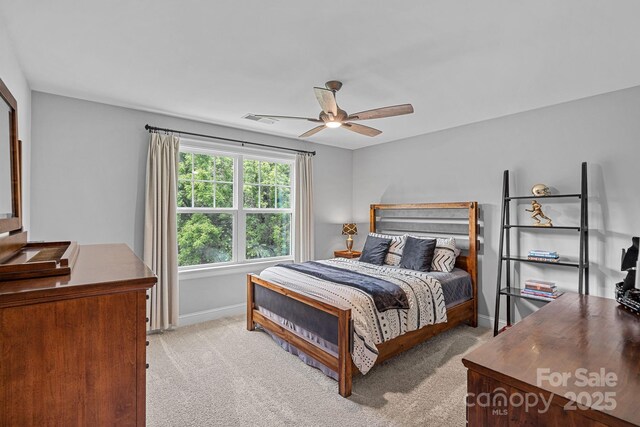 224 Hidden Meadows Dr, Mooresville, NC 28117 - bedroom featuring baseboards, light colored carpet, and a ceiling fan