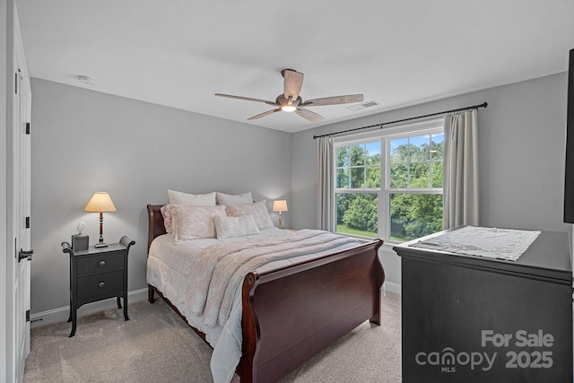 224 Hidden Meadows Dr, Mooresville, NC 28117 - bedroom with baseboards, light carpet, and ceiling fan