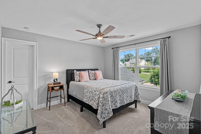 224 Hidden Meadows Dr, Mooresville, NC 28117 - carpeted bedroom featuring baseboards and ceiling fan