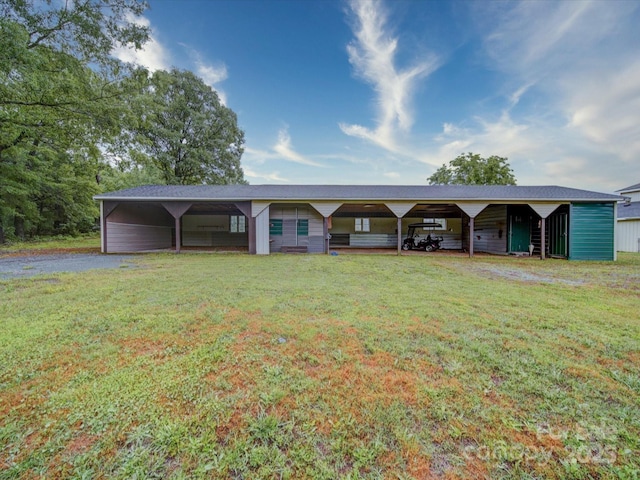 4115 Jenkins Rd, Marshville, NC 28103 - view of front of house featuring a front yard, gravel driveway, and a carport