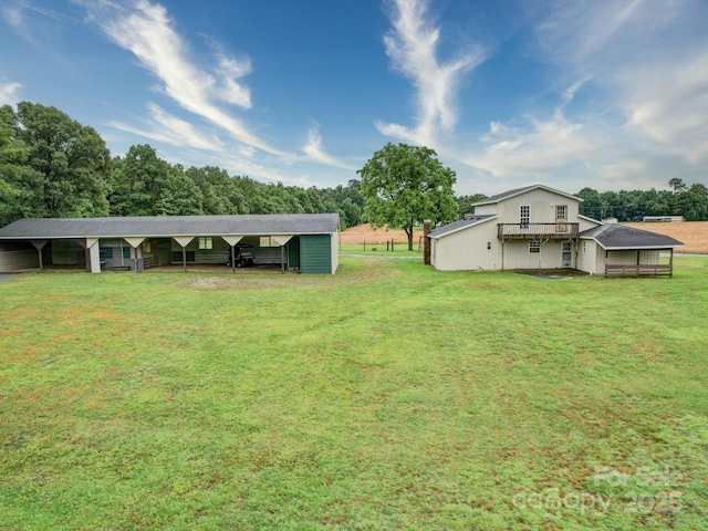 4115 Jenkins Rd, Marshville, NC 28103 - view of yard featuring an outbuilding, a carport, and an exterior structure