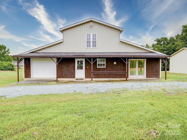 4115 Jenkins Rd, Marshville, NC 28103 - farmhouse featuring a garage, a front lawn, and driveway