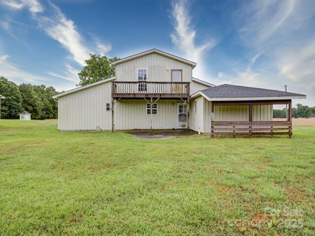 4115 Jenkins Rd, Marshville, NC 28103 - back of property with a lawn and a deck
