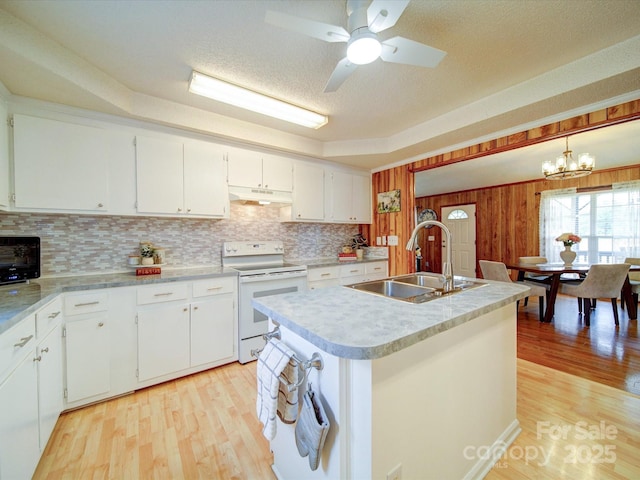 4115 Jenkins Rd, Marshville, NC 28103 - kitchen featuring white range with electric cooktop, under cabinet range hood, a chandelier, light wood finished floors, and a textured ceiling