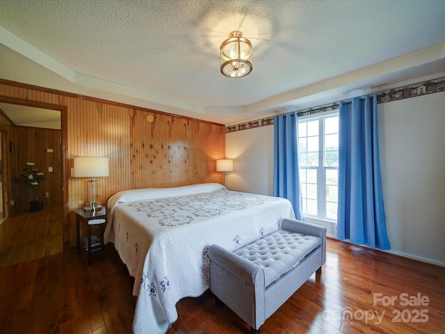 4115 Jenkins Rd, Marshville, NC 28103 - bedroom with wood-type flooring and a textured ceiling