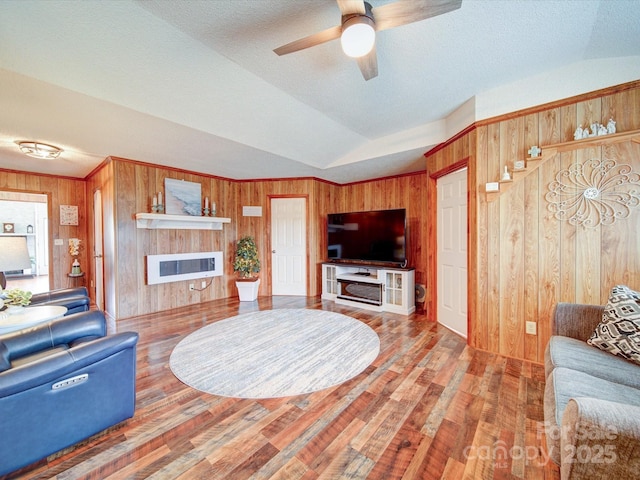 4115 Jenkins Rd, Marshville, NC 28103 - living room featuring wood walls, ceiling fan, wood finished floors, and a textured ceiling