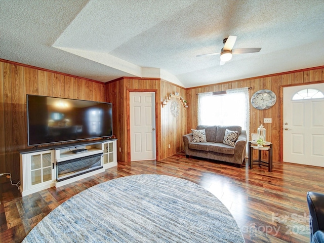 4115 Jenkins Rd, Marshville, NC 28103 - living area with wooden walls, healthy amount of natural light, a textured ceiling, ceiling fan, and wood finished floors