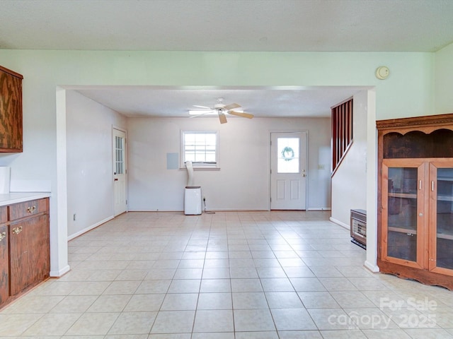 4115 Jenkins Rd, Marshville, NC 28103 - unfurnished living room featuring a ceiling fan and light tile patterned flooring