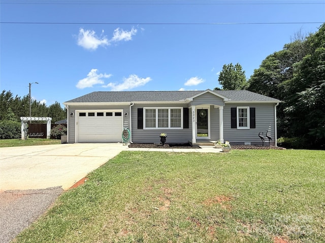 5323 Flat Creek Rd, Heath Springs, SC 29058 - ranch-style home with an attached garage, driveway, a front lawn, and a shingled roof
