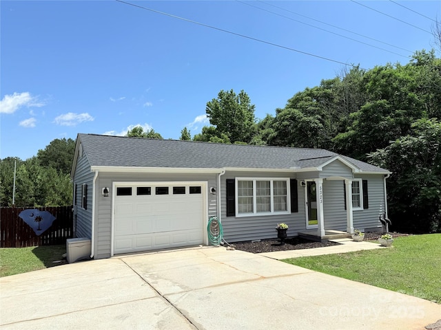 5323 Flat Creek Rd, Heath Springs, SC 29058 - ranch-style house with an attached garage, driveway, and roof with shingles
