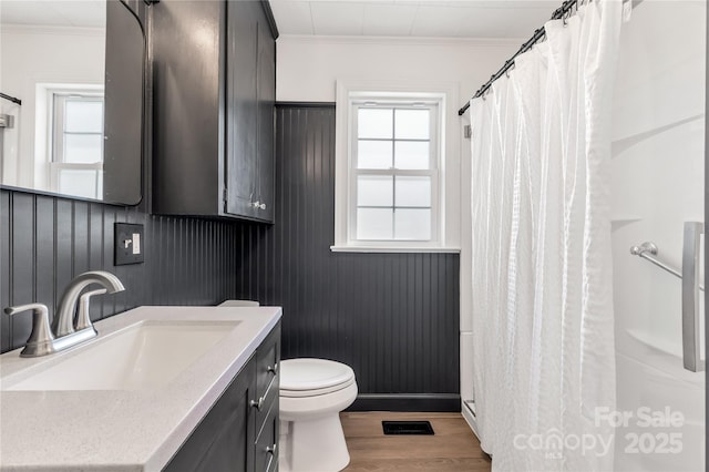 5323 Flat Creek Rd, Heath Springs, SC 29058 - bathroom with ornamental molding, vanity, wood finished floors, and a shower with shower curtain