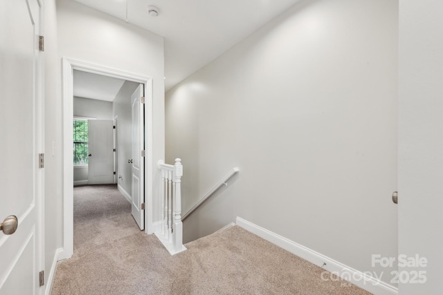 1126 Dean Hall Ln, Matthews, NC 28105 - hallway with an upstairs landing, carpet, and baseboards